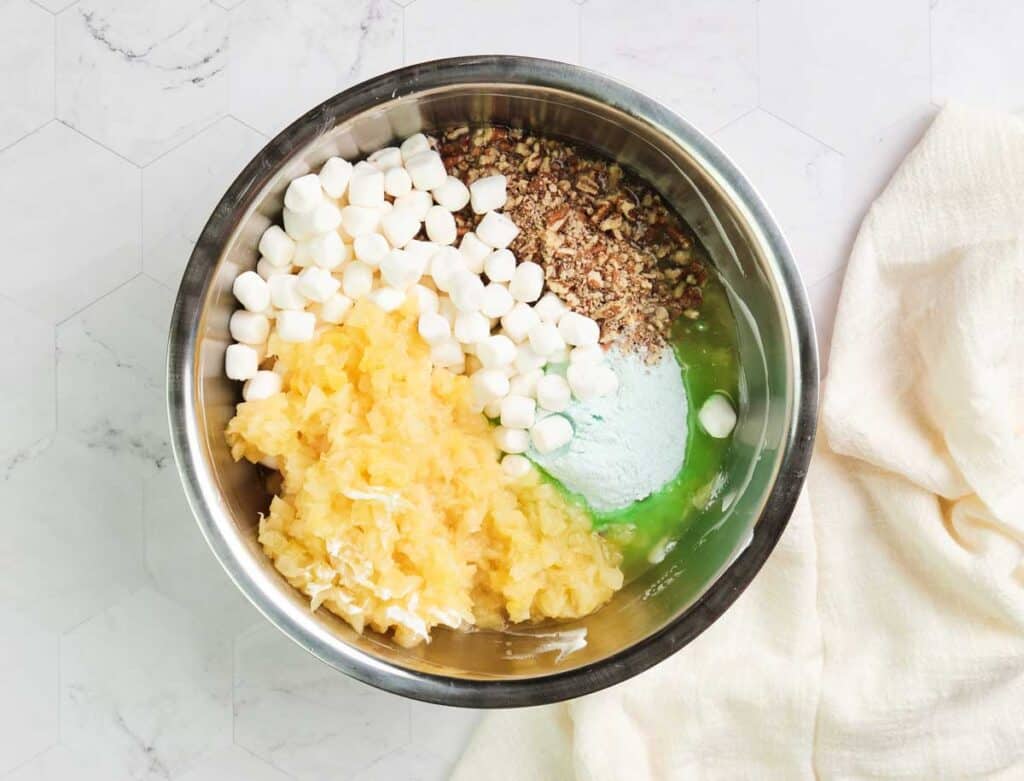 watergate salad ingredients in metal bowl from overhead