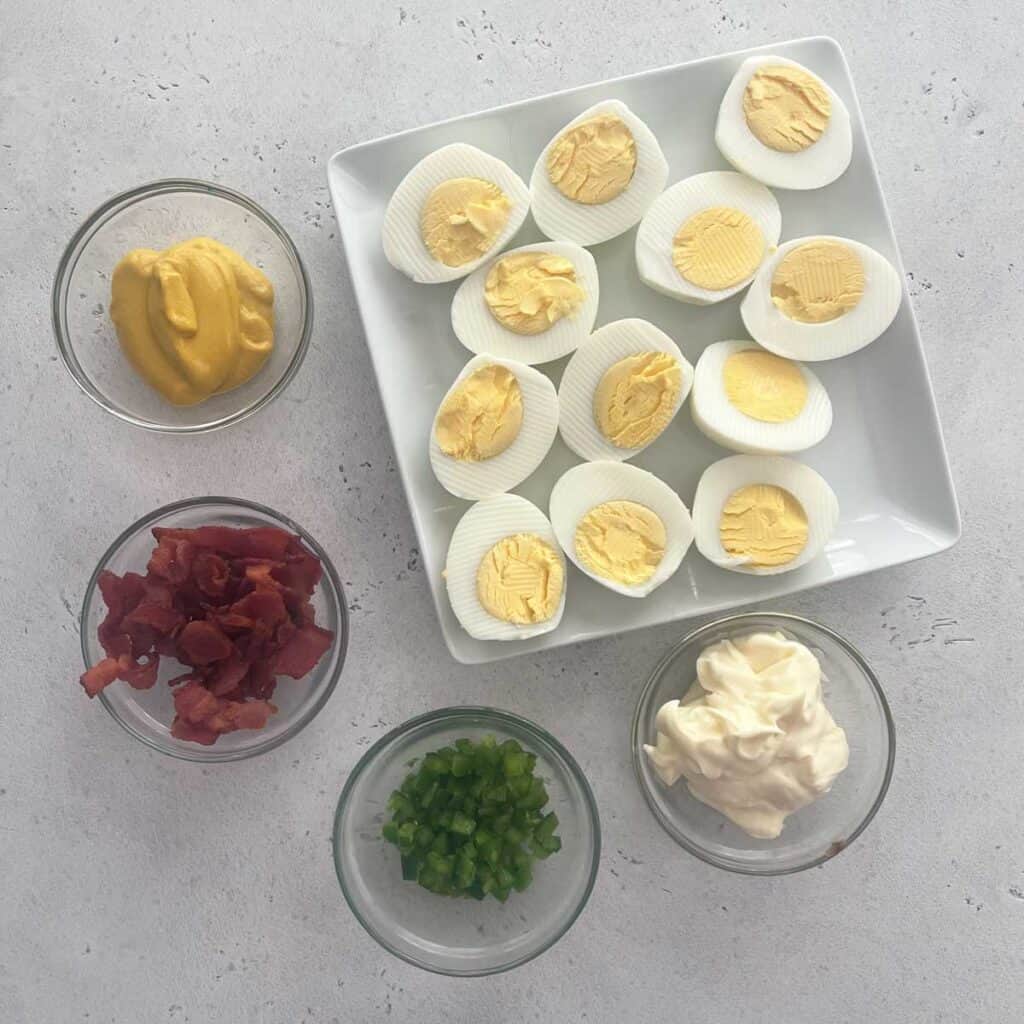bacon jalapeno deviled egg ingredients on countertop