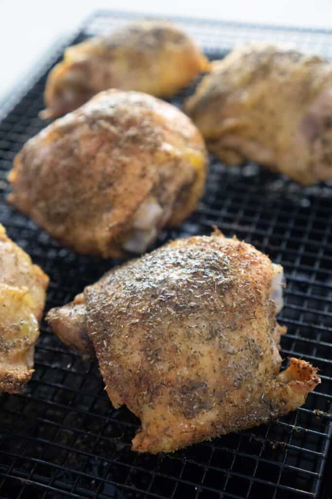 baked chicken thighs on wire rack