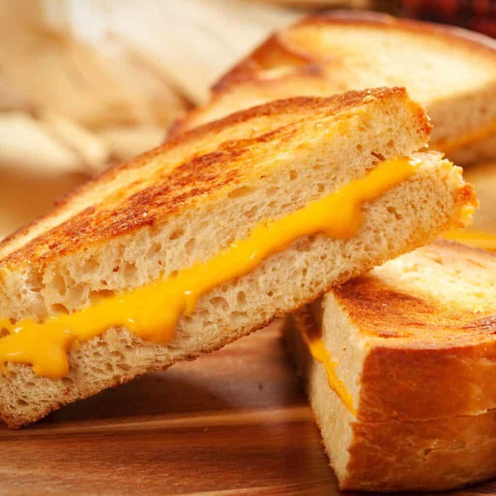 grilled cheese sandwich cut in half and stacked