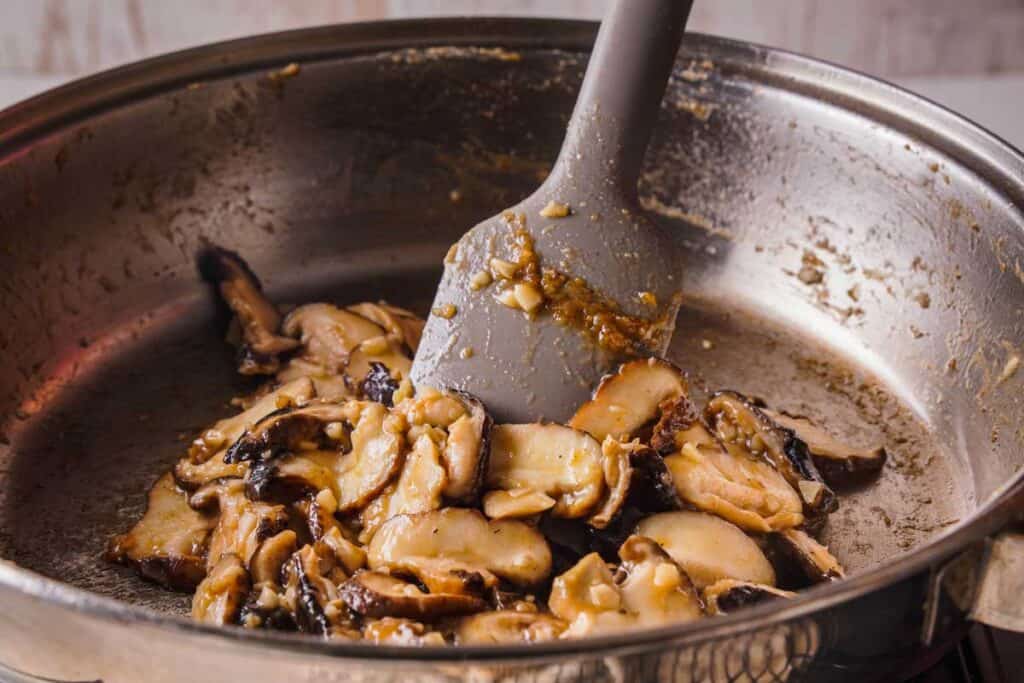 sautéing mushrooms in pan