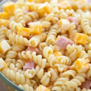 close up of simple pasta salad with ham and cheese cubes