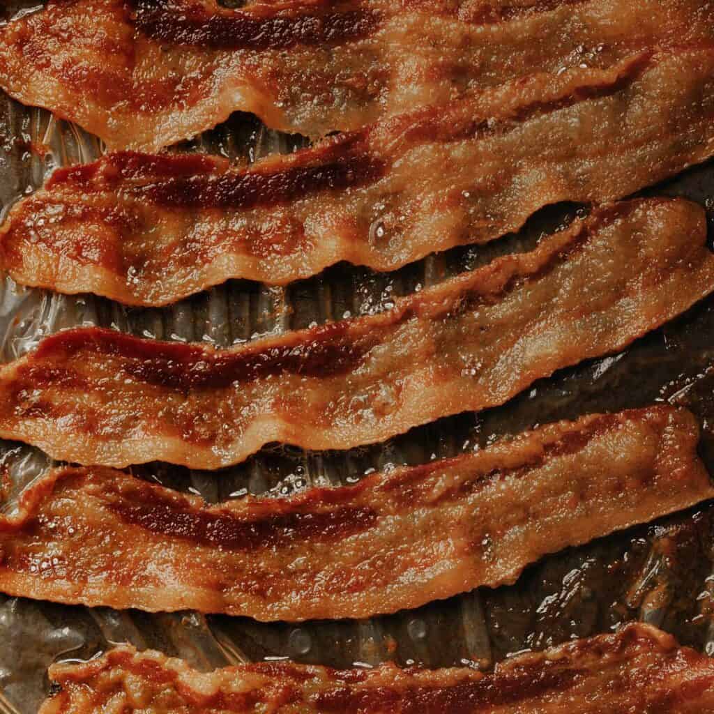 slices of cooked bacon