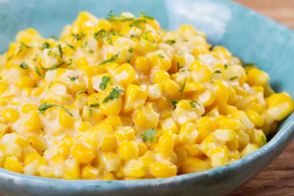 Southern creamed corn in blue bowl