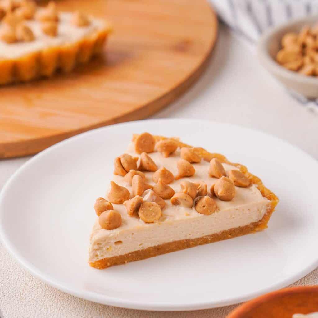 slice of no bake peanut butter pie on white plate