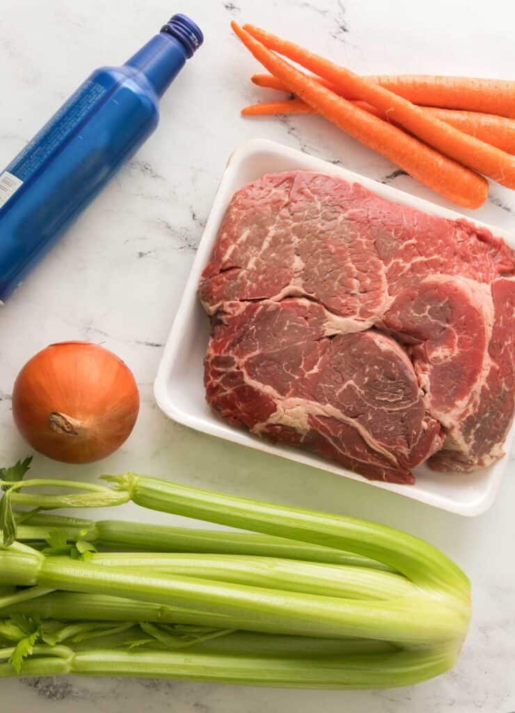 pot roast ingredients on marble counter