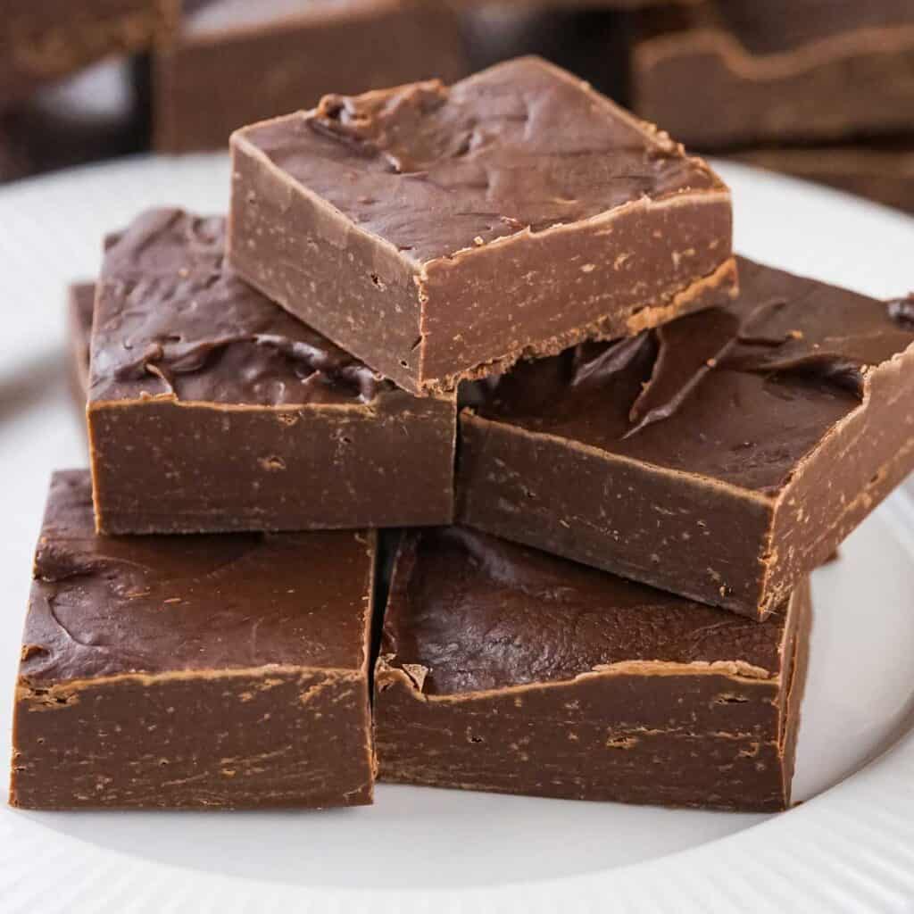 stack of pieces of 2 ingredient microwave chocolate fudge