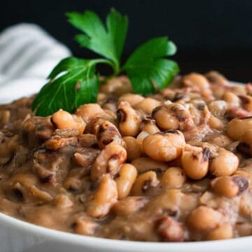 cooked black eyed peas in white bowl