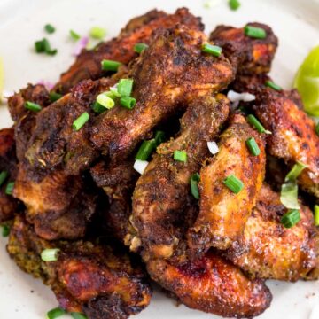jerk chicken on white plate