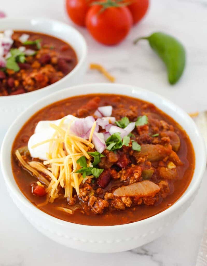 two bowls of slow cooker turkey chili