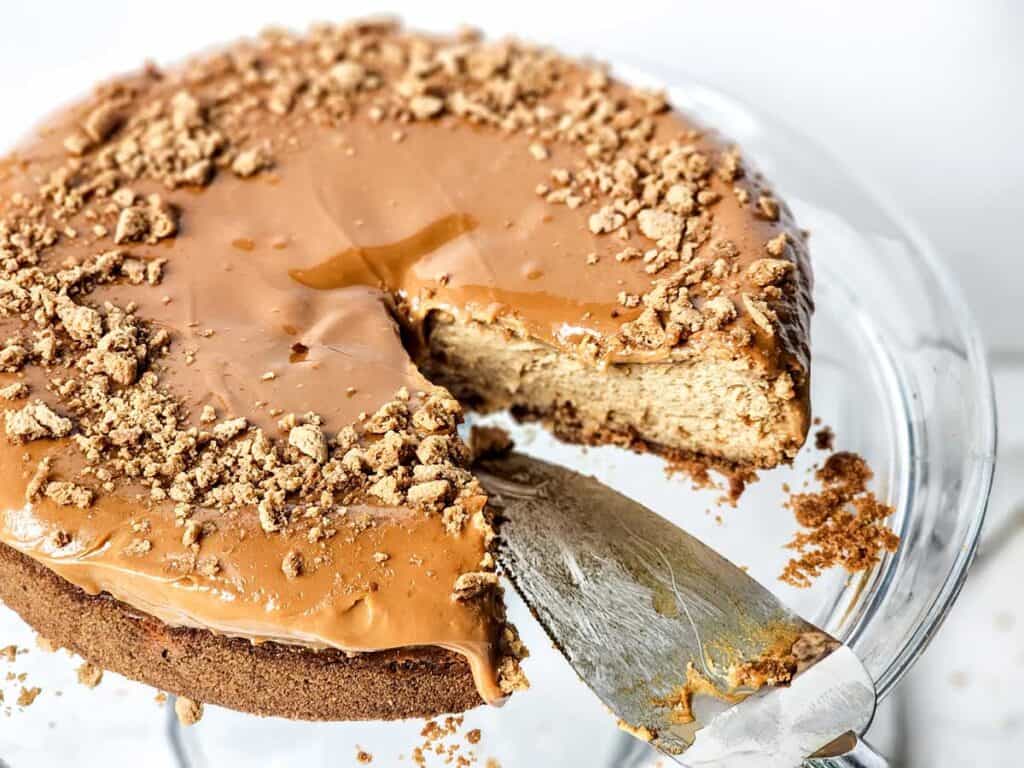 gingerbread cheesecake with one slice removed