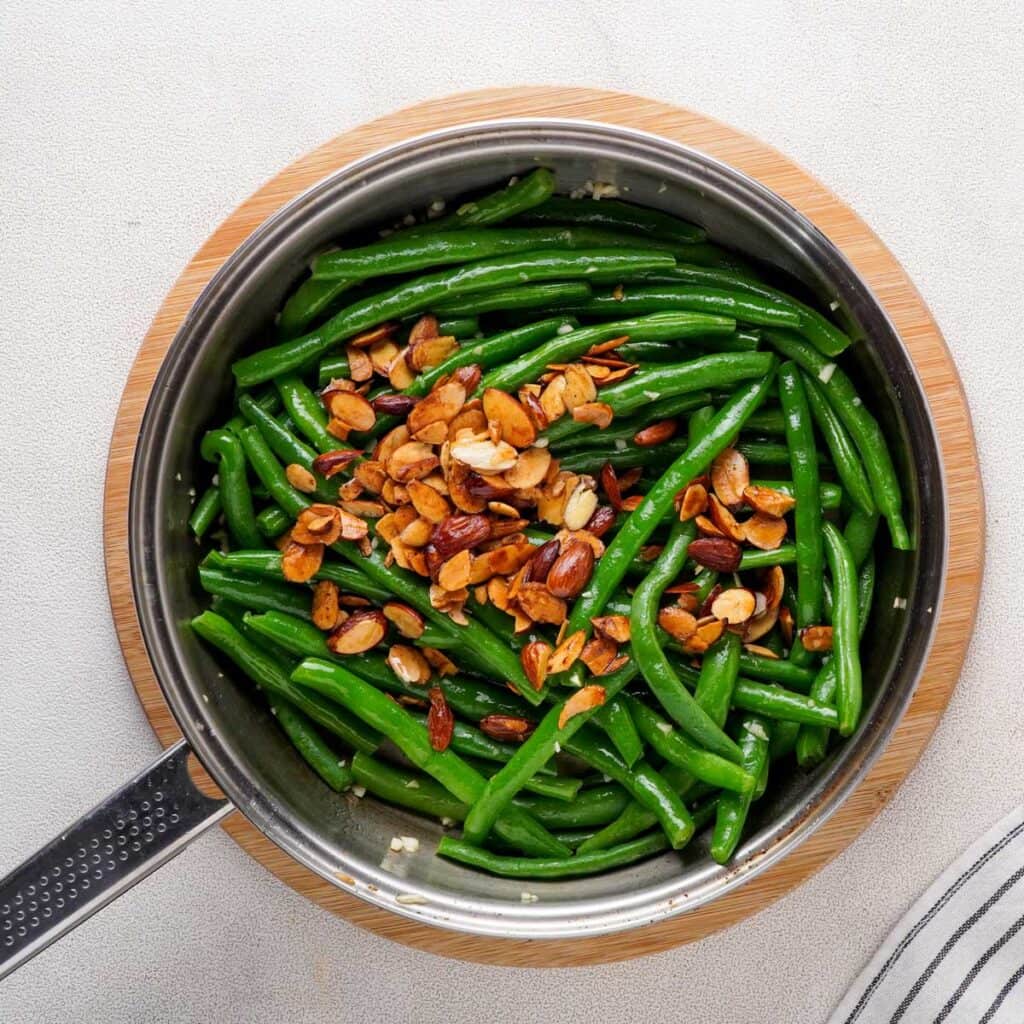 green beans and toasted almonds in pot