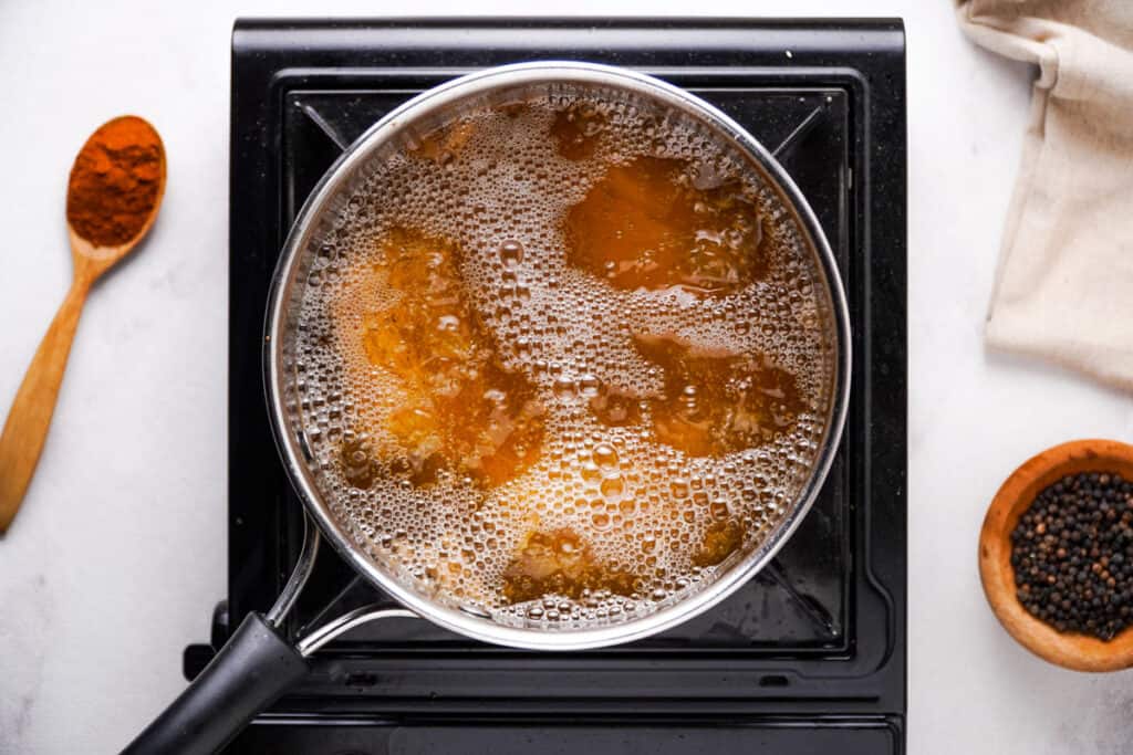 fried chicken cooking in oil