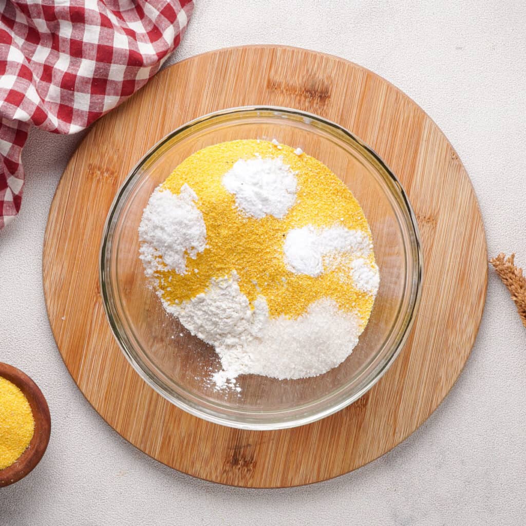 cornmeal and flour in glass bowl