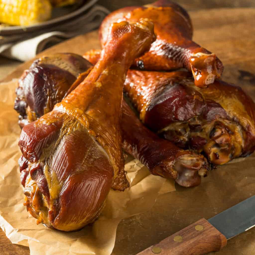 smoked turkey legs stacked on each other