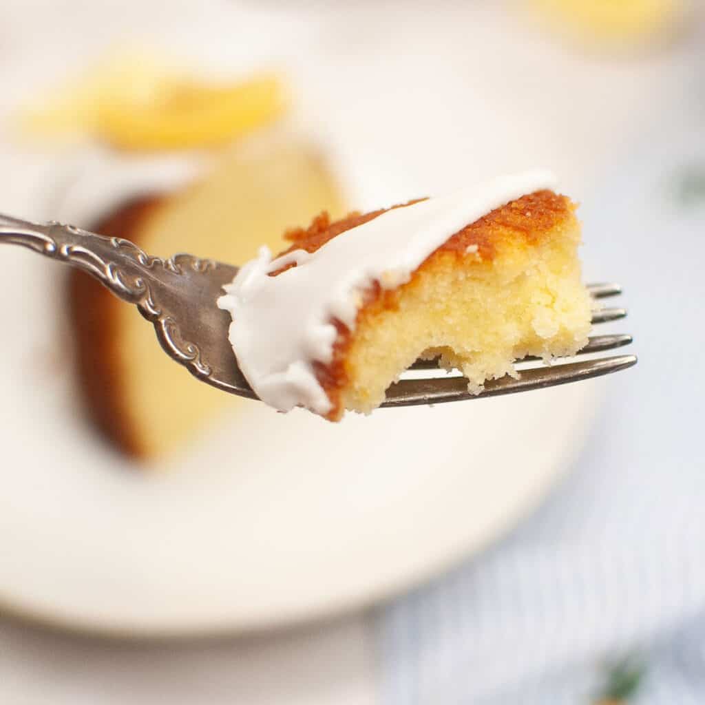 bite of lemon bundt cake on fork