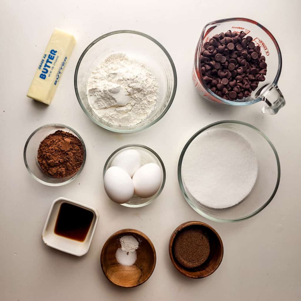brownie cookie ingredients in glass bowls