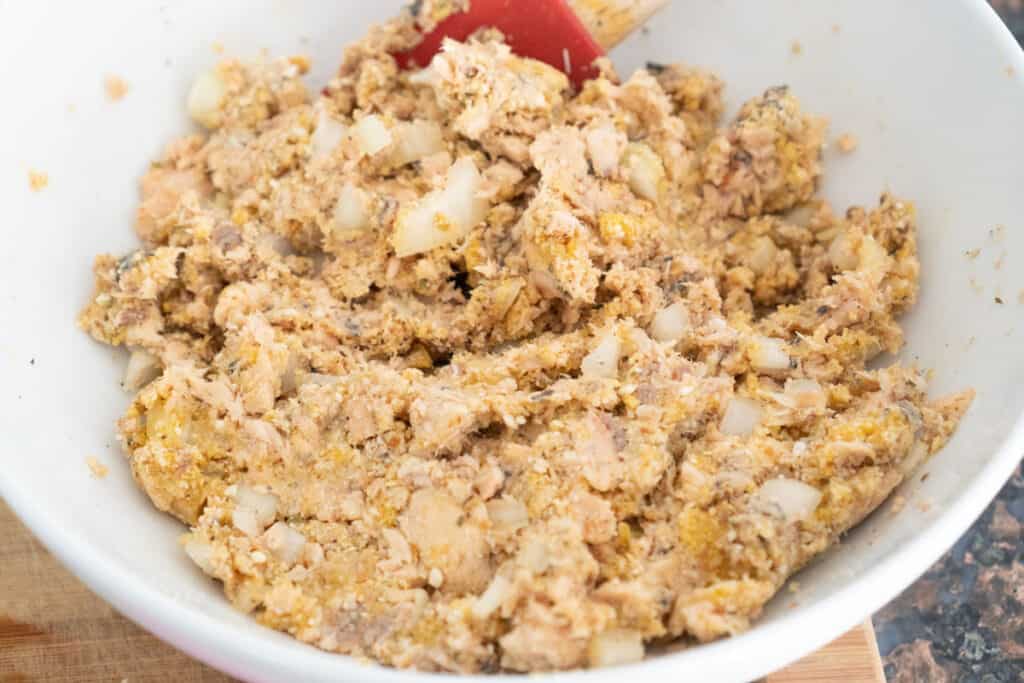 salmon and breadcrumbs mixing in bowl