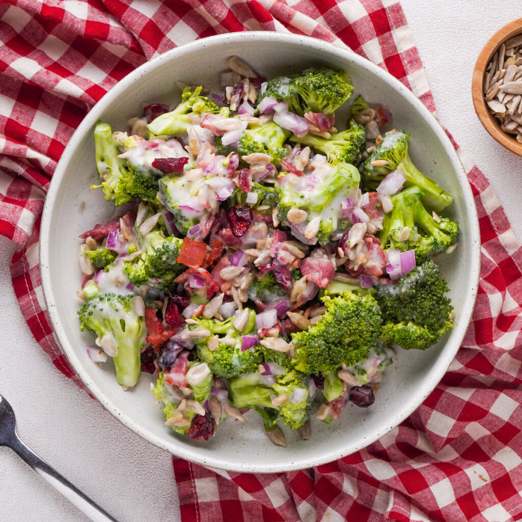 broccoli salad in white bowl