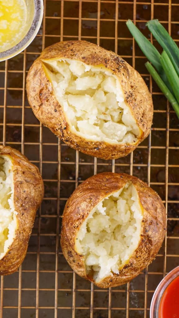 baked potatoes on wire rack