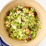 brussels sprouts salad in brown bowl