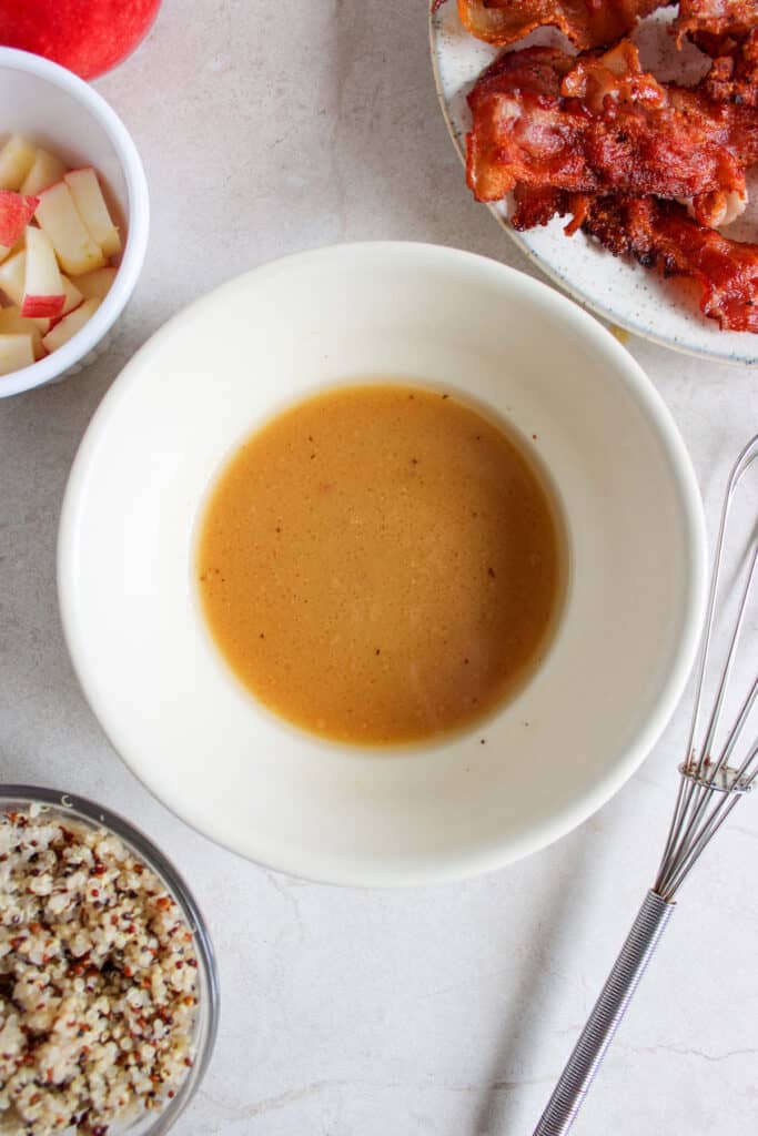 bacon vinaigrette in white bowl