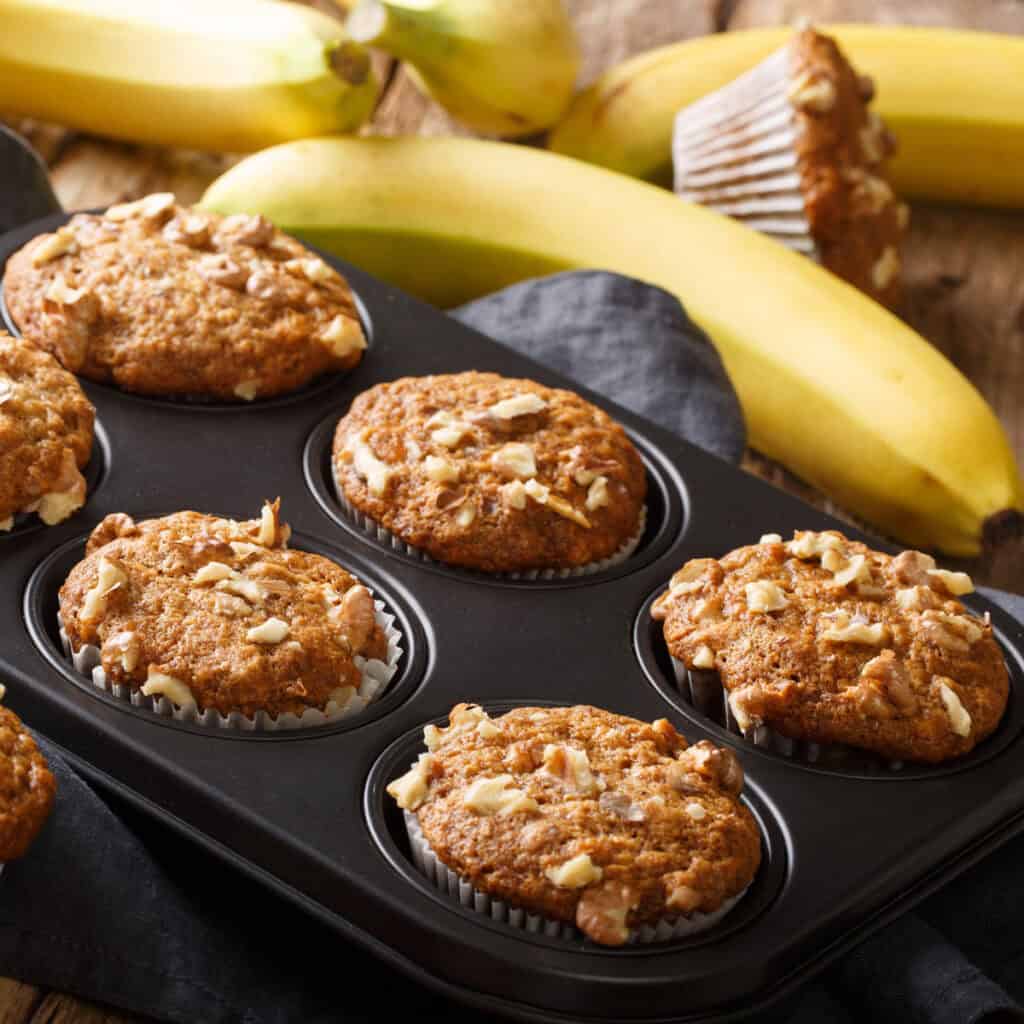 banana nut muffins in muffin tin
