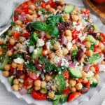 Mediterranean Chickpea Salad in fluted bowl