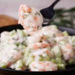 fork with bite of Shrimp salad