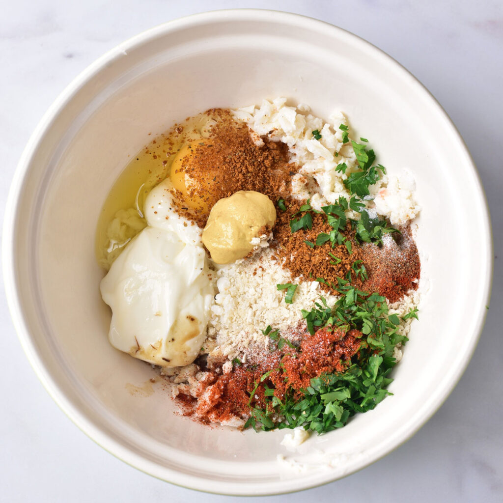 crab cake ingredients in bowl before mixing