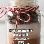 hot cocoa mix in a jar with ingredient list overlay
