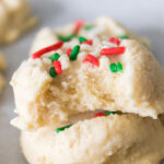 whipped shortbread cookie with bite taken out of it