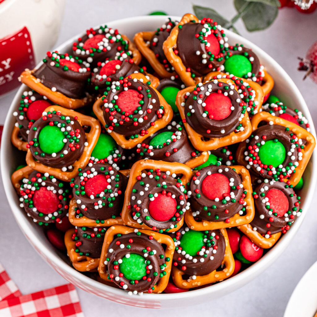 Christmas rolo pretzel bites in white bowl