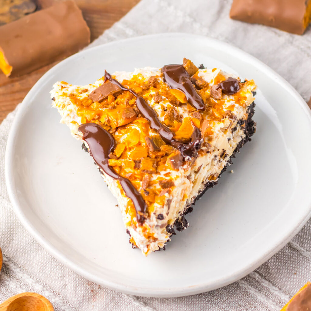 slice of butterfinger pie on white plate