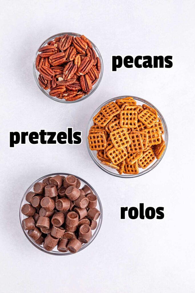 three bowls with pretzels, pecans, and rolos