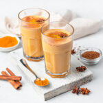 two glasses of turmeric coffee