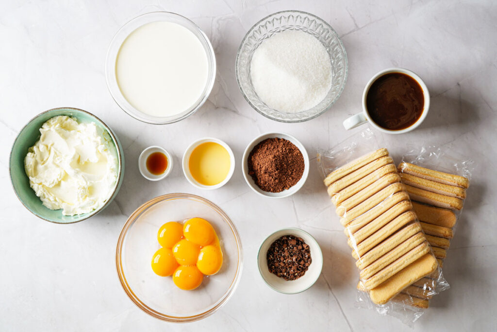 tiramisu ingredients in bowls on countertop