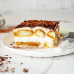 serving of tiramisu on white plate
