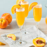 bellinis with peaches on table