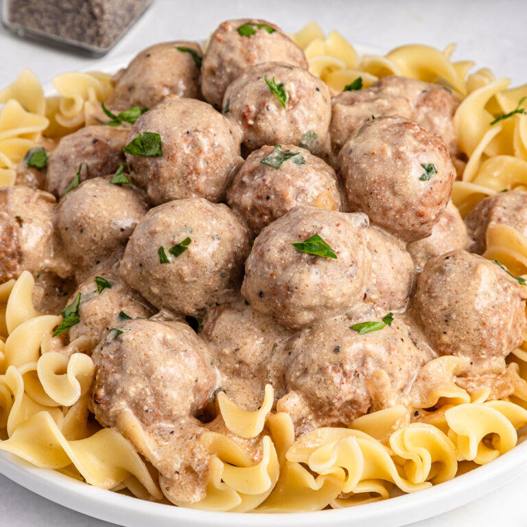 slow cooker swedish meatballs in white bowl