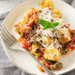 bacon gnocchi on white plate