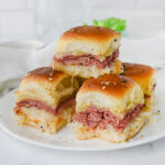 reuben sliders on white plate