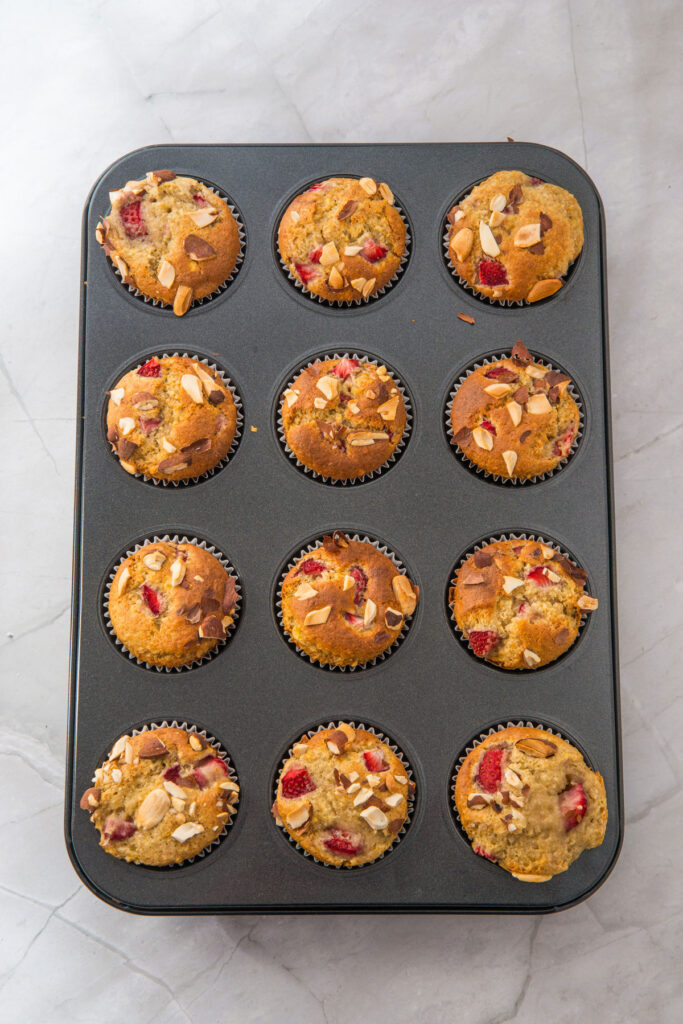 strawberry banana muffins in muffin tin