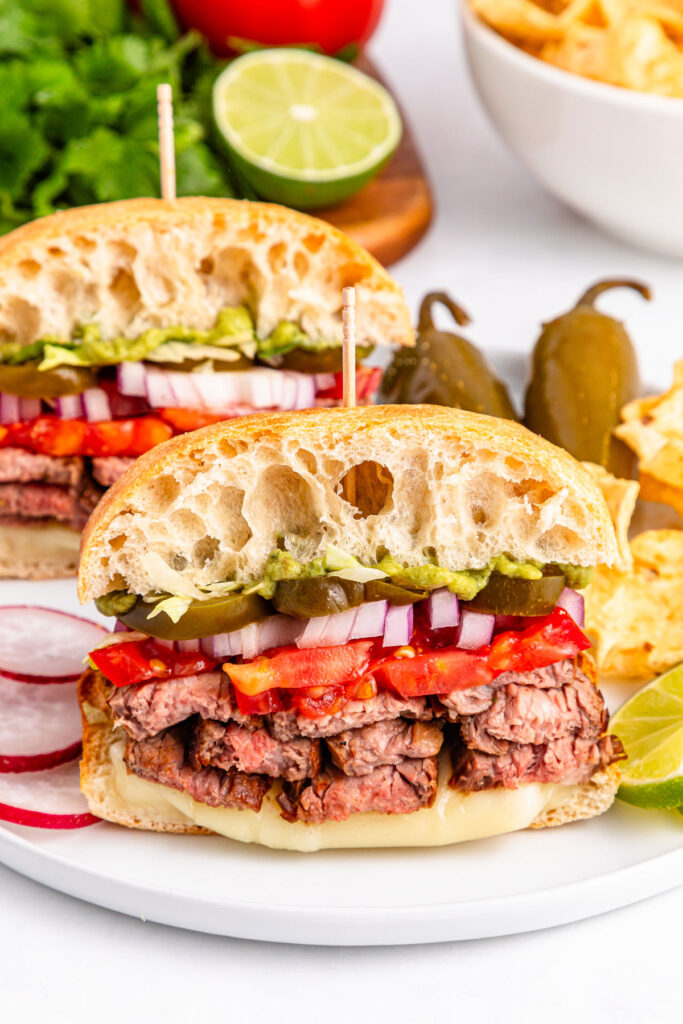 halved carne asada tortas