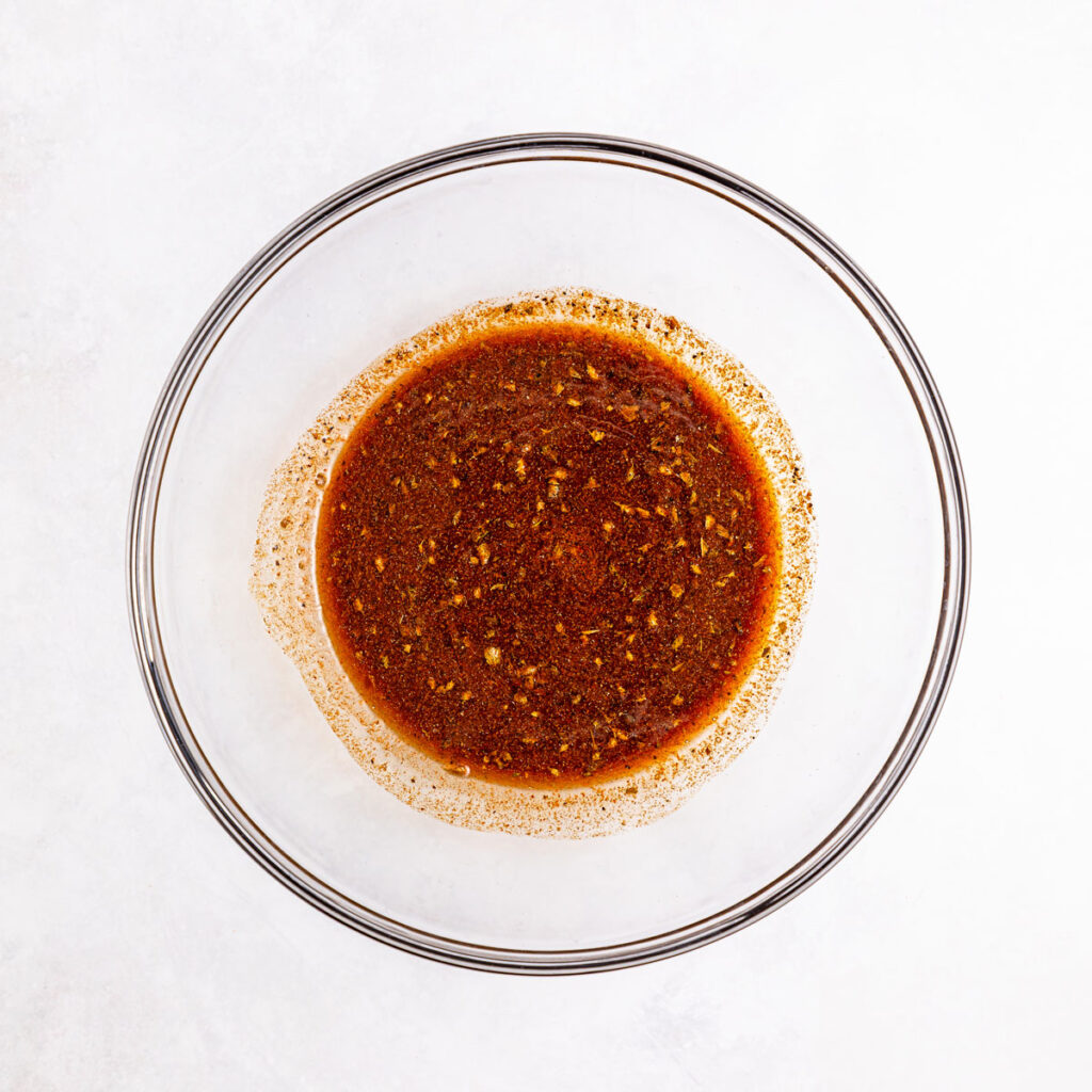 carne asada marinade in glass bowl