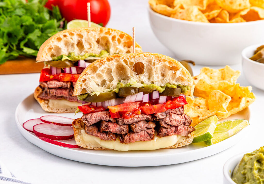 carne asada tortas on white plate