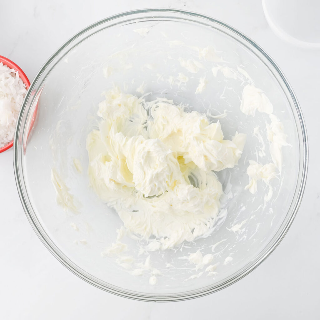 whipped cream in glass bowl