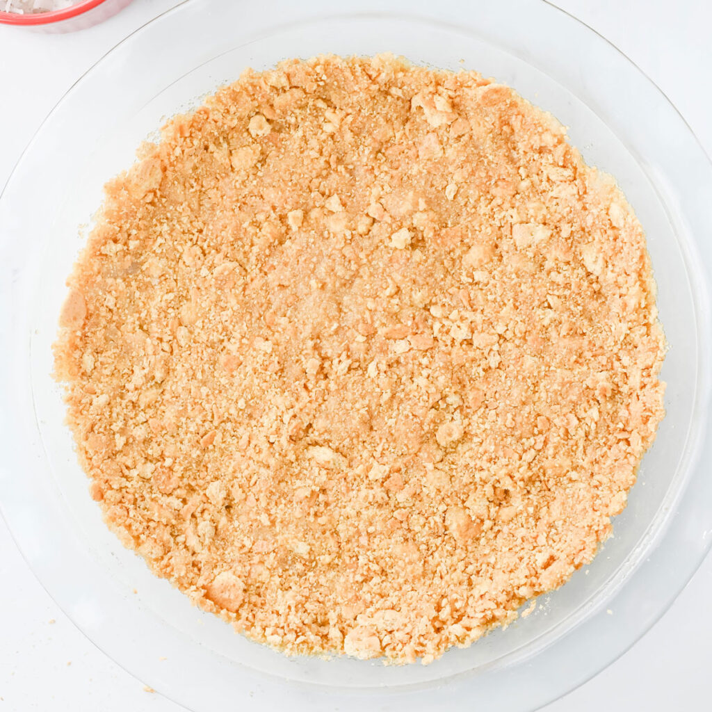 graham cracker crust in glass pie dish