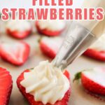 close up of piping bag adding cheesecake filling to halved strawberry to make deviled strawberries and recipe name overlay