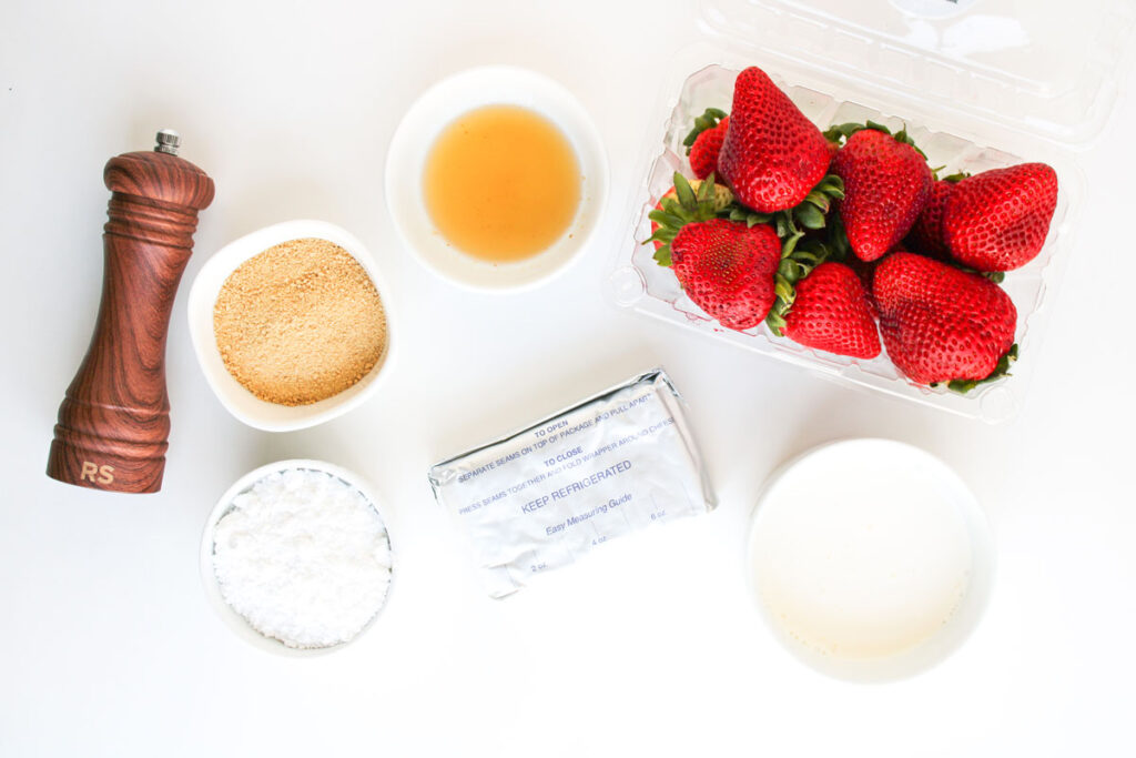 deviled strawberries ingredients on white countertop